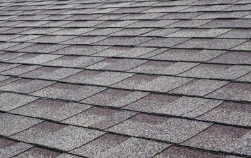 Burnworthy tiles for shallow pitch roofing